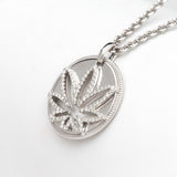 Modern 7 Leaf Sterling Silver Cutout Disc Pendant with White Diamonds