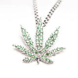 White Gold Sativa Leaf Pendant with Green Garnet Gemstones