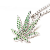 White Gold Sativa Leaf Pendant with Green Garnet Gemstones